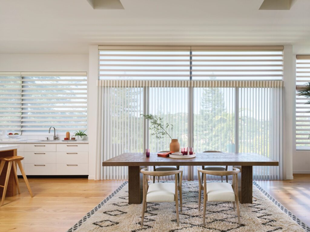 Luminette® Sheer Panels Open Spaces Dining Room — graceful flow with soft light and movement.